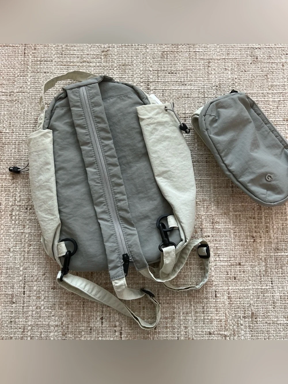 Glowmode gray backpack with detachable pouch and separate zip strap